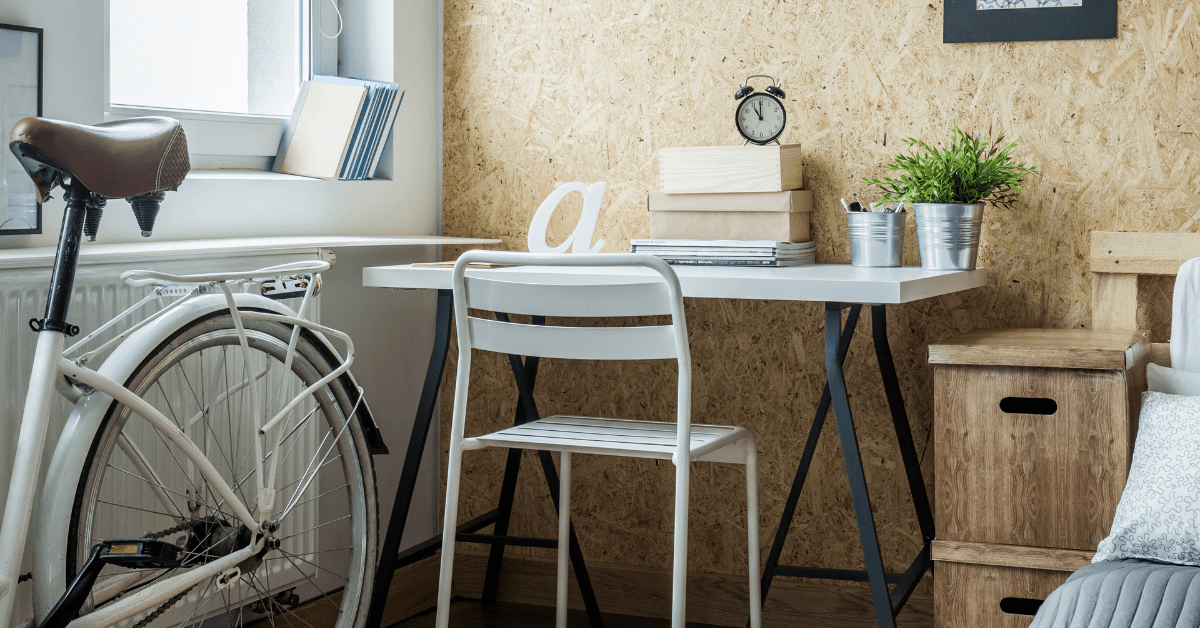 White small corner desk and matching chair.