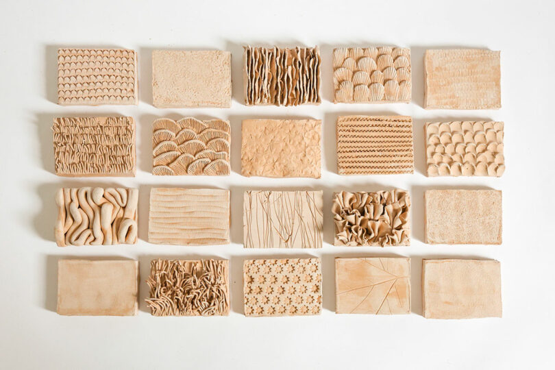 20 arranged clay blocks with different textured surfaces