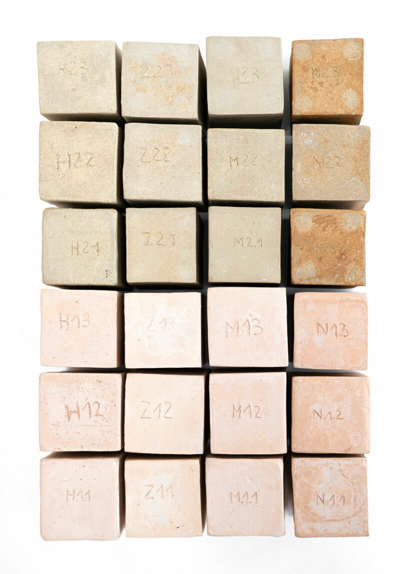 blocks of different colored clay arranged in stacked order with numbers on bottom