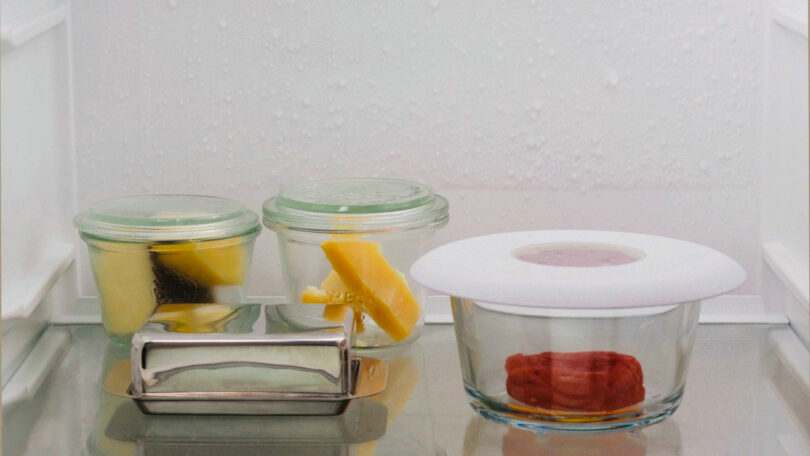 view of shelf in refrigerator with food storage containers