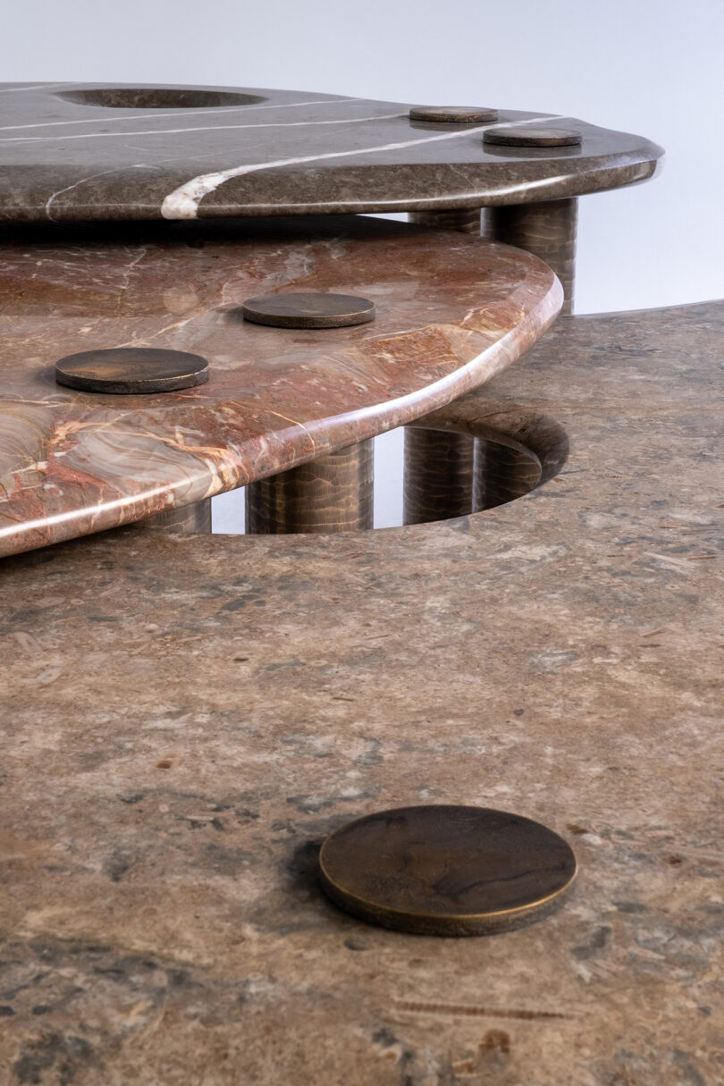 detail of metal and marble tables