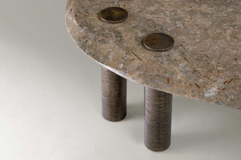 detail of metal and marble table