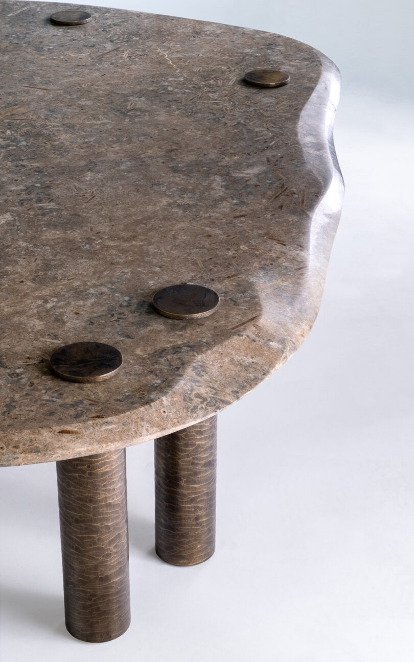 detail of metal and marble table