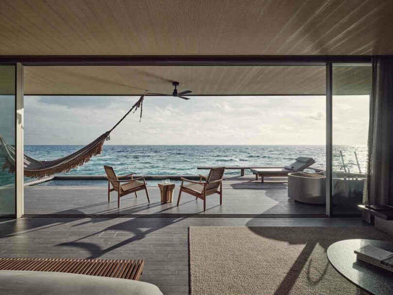 Contemporary Ocean Villa at Patina Maldives, featuring minimalist design with a neutral color palette and natural materials