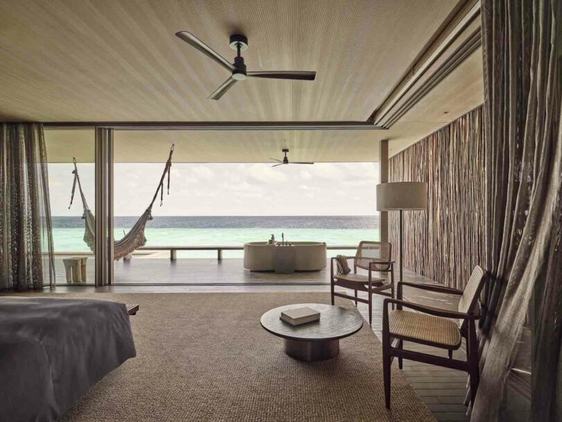 Contemporary Ocean Villa at Patina Maldives, featuring minimalist design with a neutral color palette and natural materials