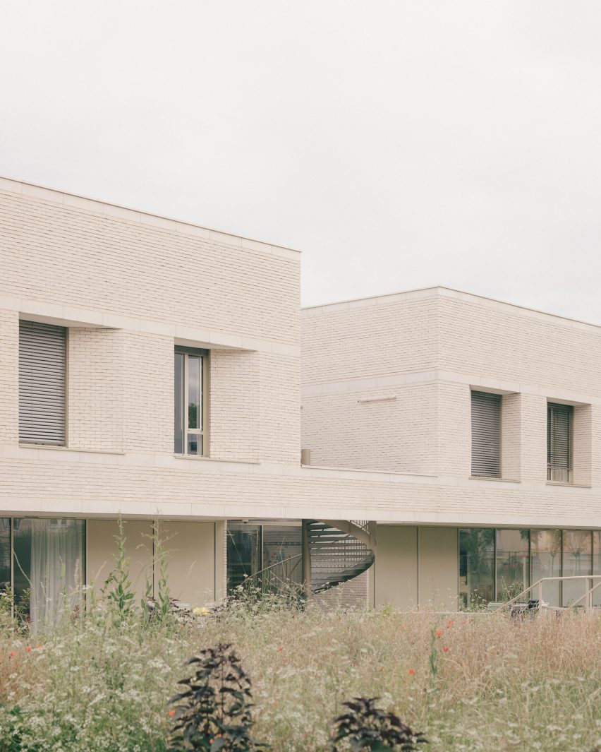 Brick facade and staircase of EAM Assisted Living Facility in Paris by Vallet de Martinis Architectes