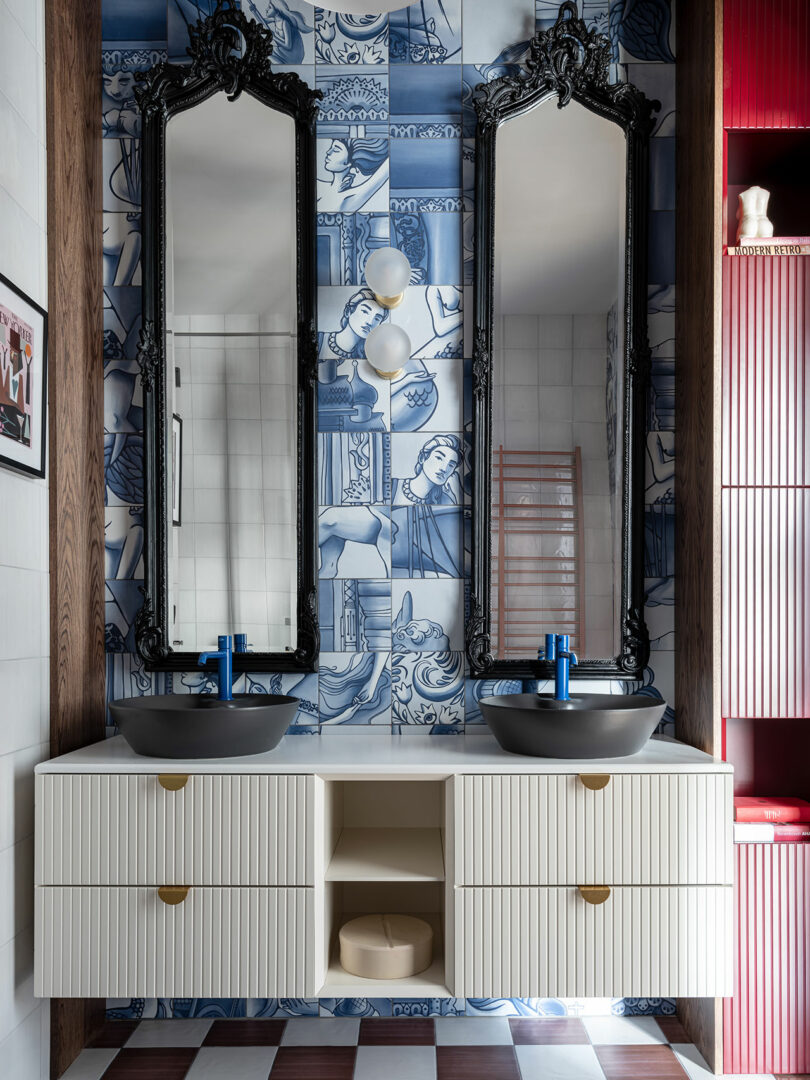 modern bold bathroom with blue and white patterned wall with double white sink with black sink bowls and blue fixtures