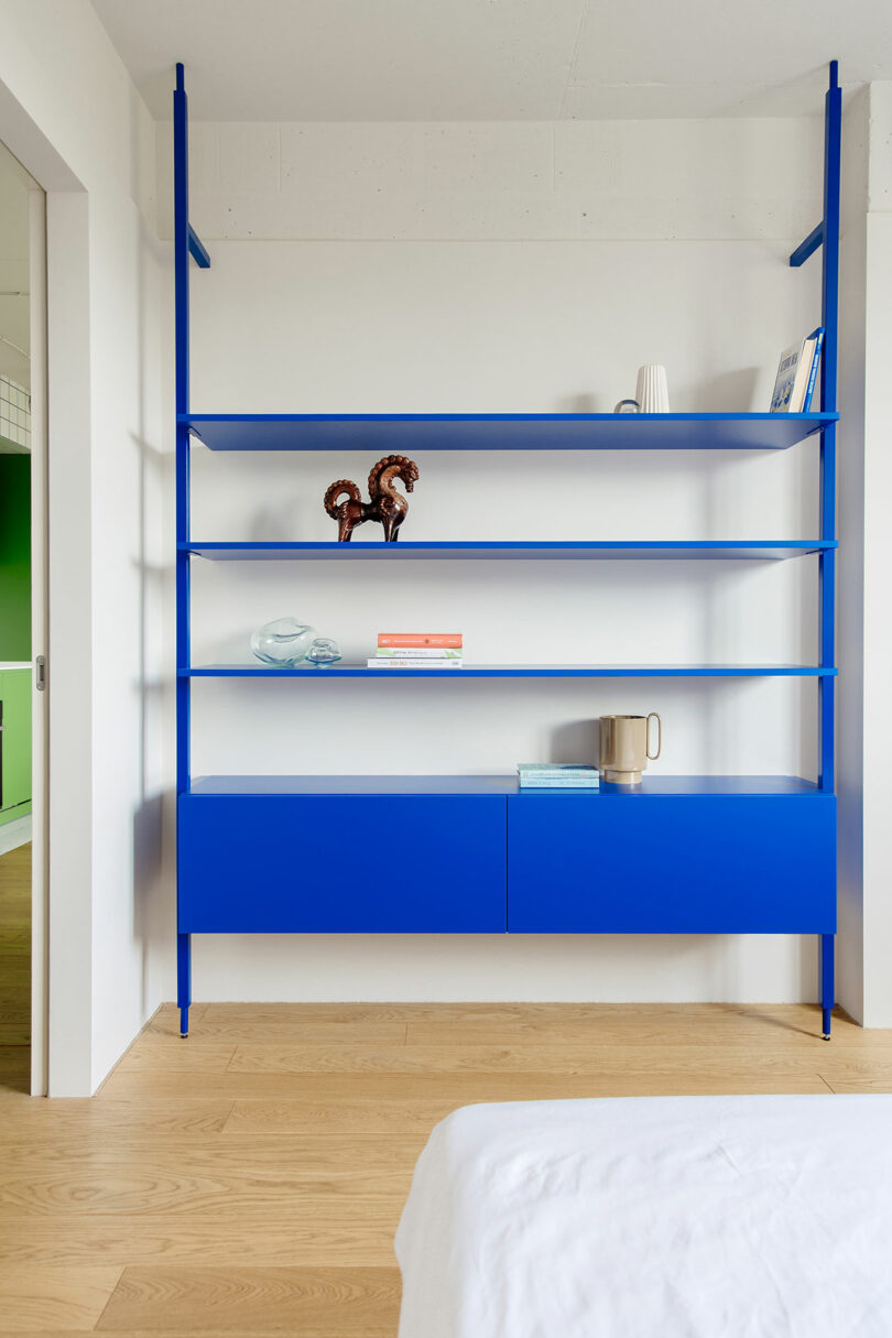 view of bright blue modern shelf
