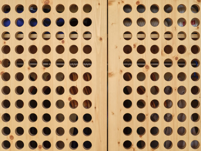 perforated wooden cabinet front
