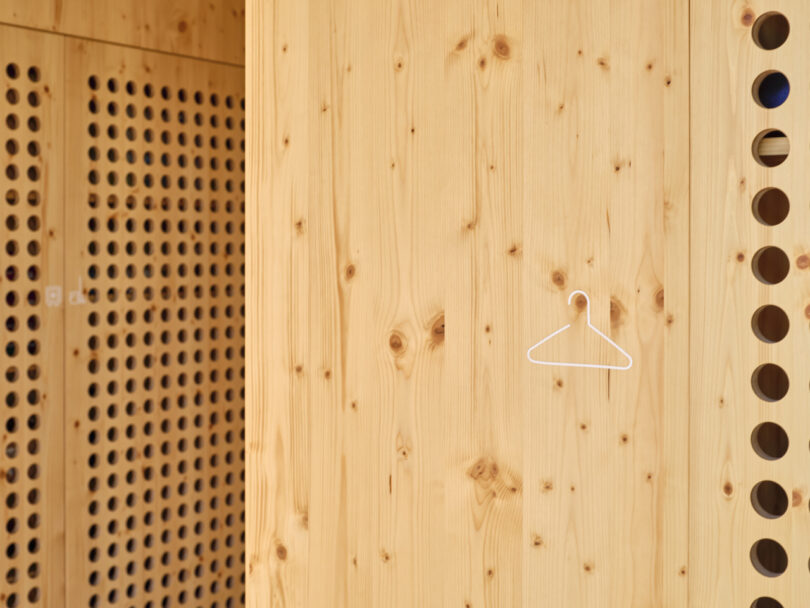 perforated wooden cabinet front