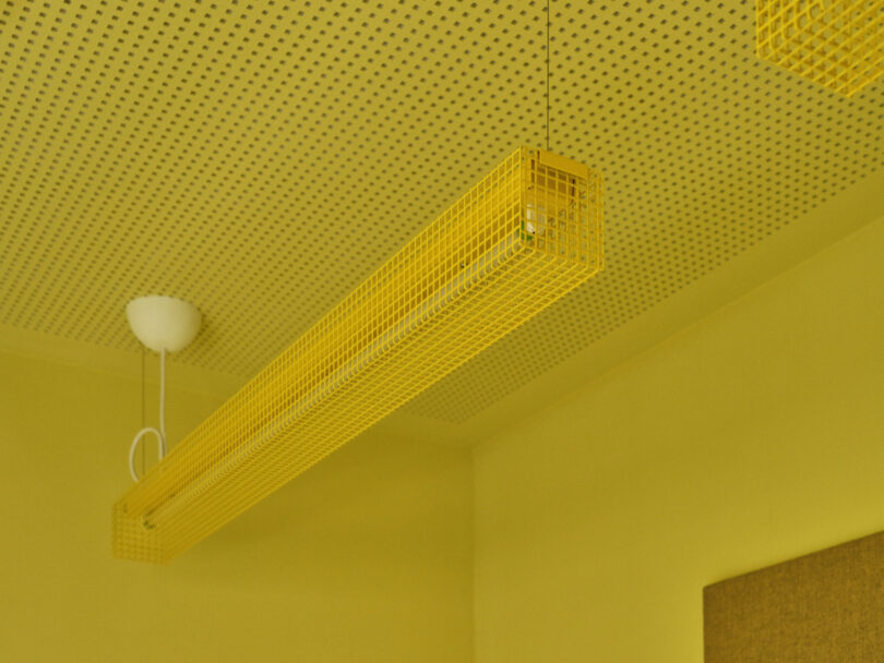 yellow fixture in yellow conference room