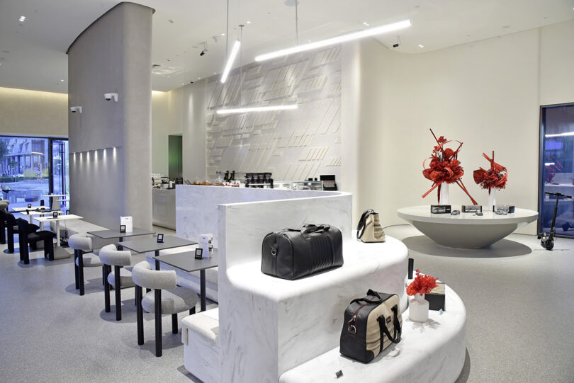 Mercedes-Benz Brand Center in Dubai interior cafe and merchandise display.