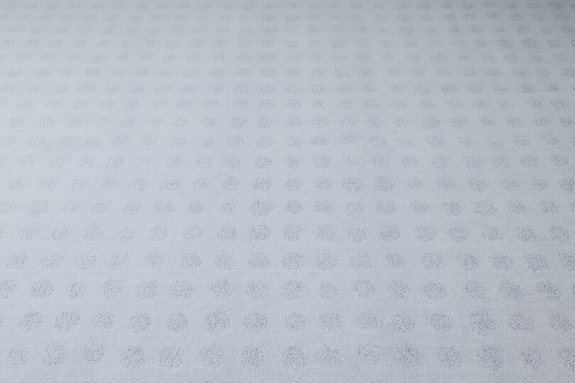 detail of tone on tone light grey rug pattern