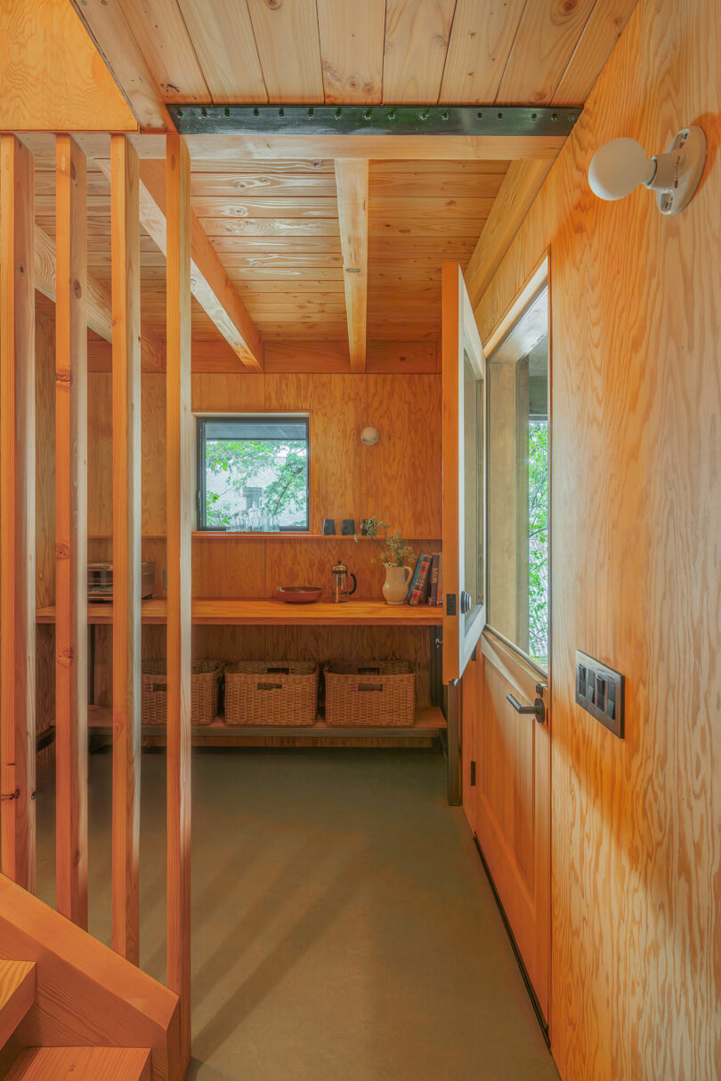 interior view of rustic modern cabin with wood paneled walls