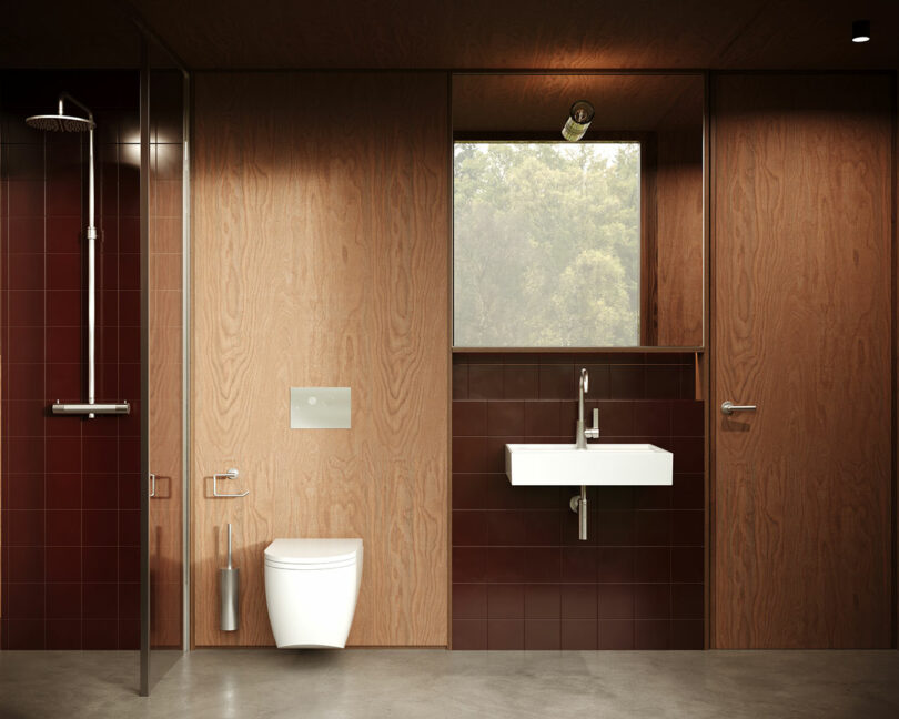 Modern bathroom interior with wood paneling and brown tiles, featuring a wall-mounted toilet, sink, and a glass shower cubicle.