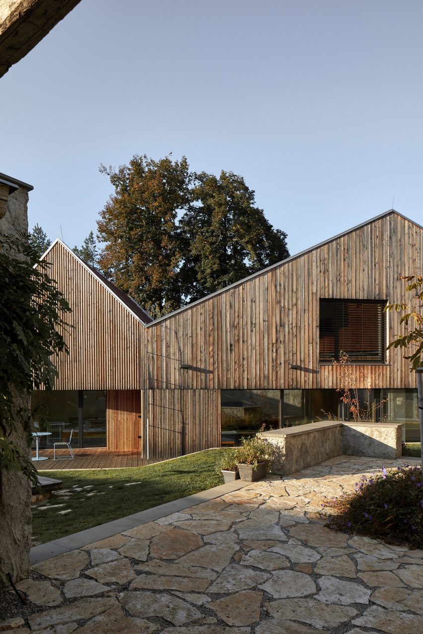 Patio overlooking wooden home