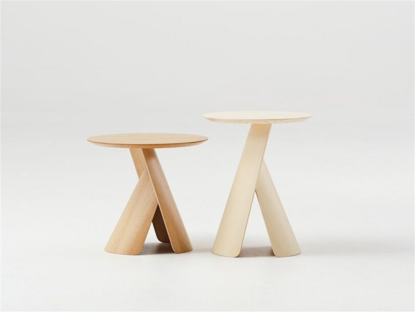 two wooden coffee tables in grey room