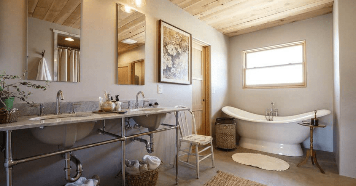 farmhouse style master bathroom with free standing tub rustic mat pedestal chrome his and her sinks with mirrors