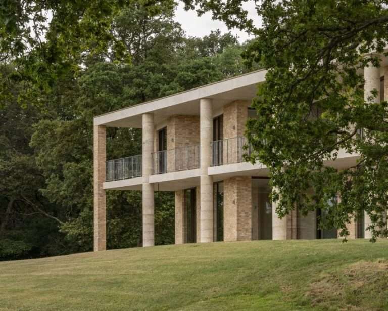 Concrete columns frame Bury Gate Farm house by Sandy Rendel Architects