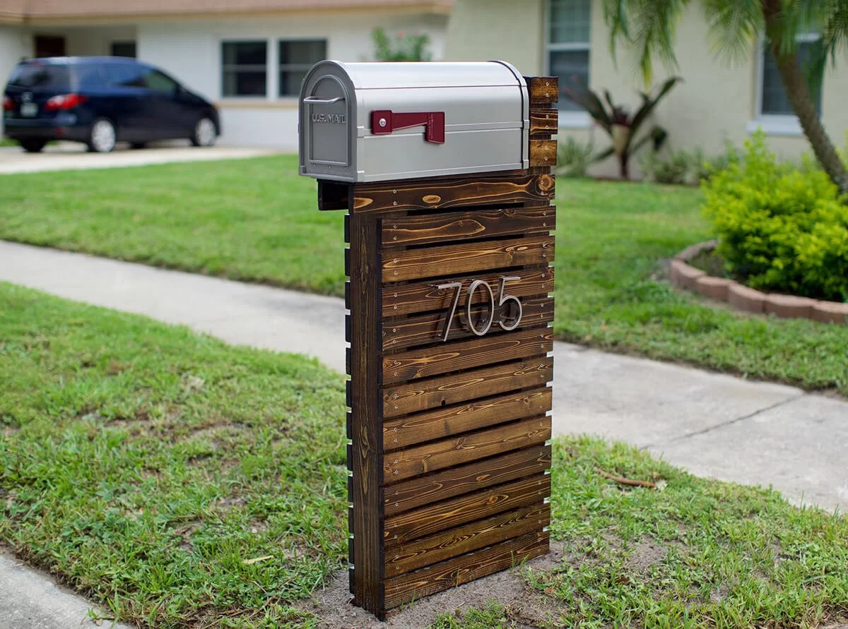 modern mailbox with wood slat wall