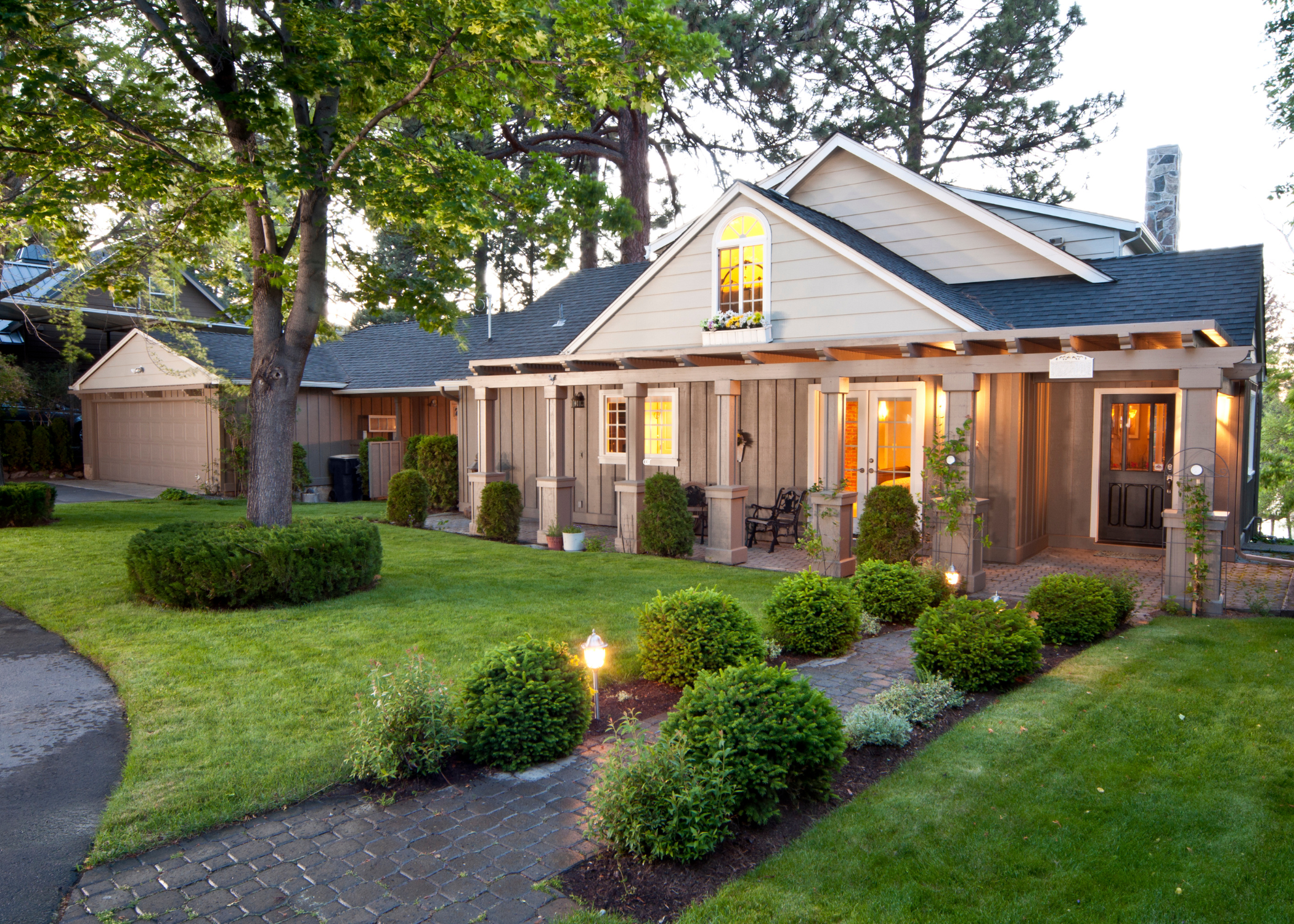 exterior of home with landscaped yard