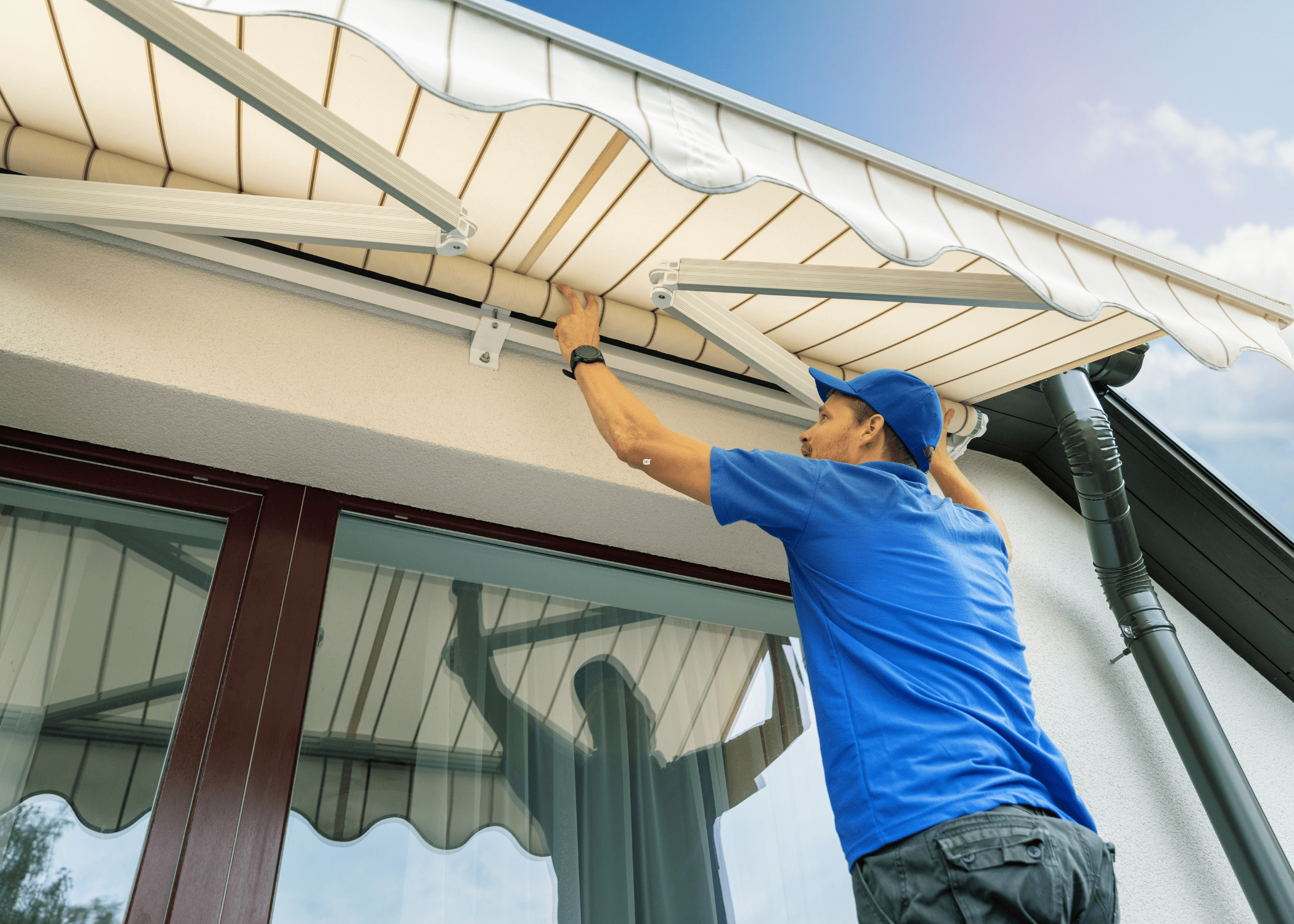 close up of man installing a awning