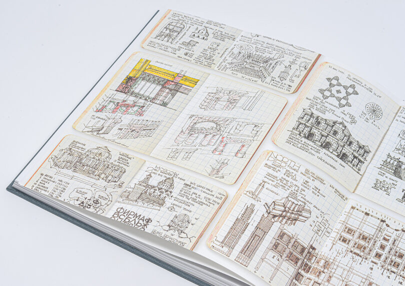 An open book displaying architectural drawings and notes.