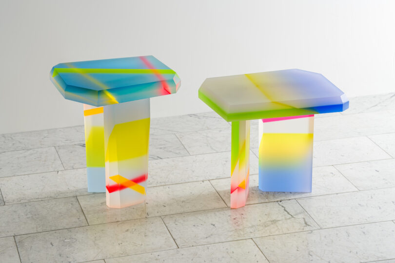 two colorful lucite coffee tables