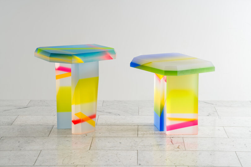 two colorful lucite coffee tables
