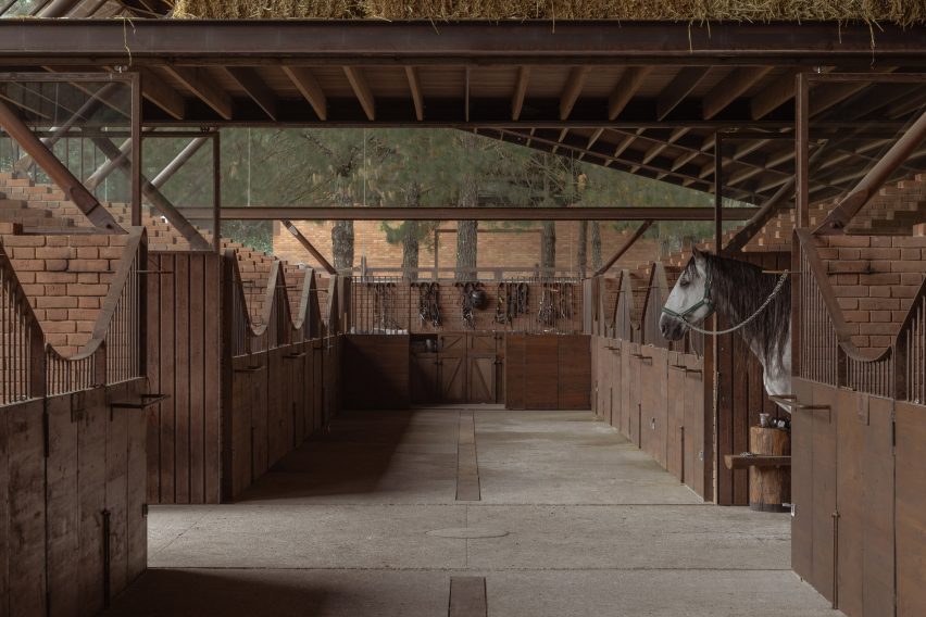 Inside the stable building with a main nave running through the centre