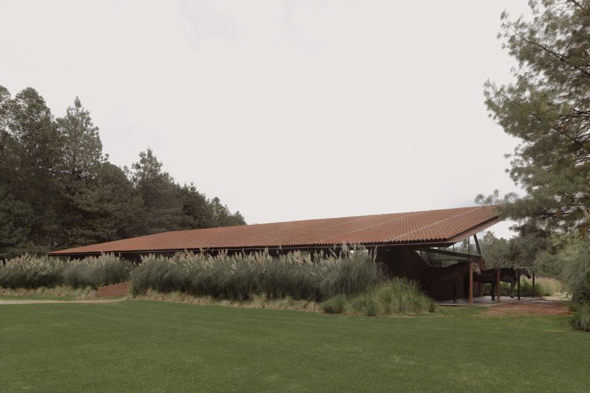 Stable building topped with clay tiles