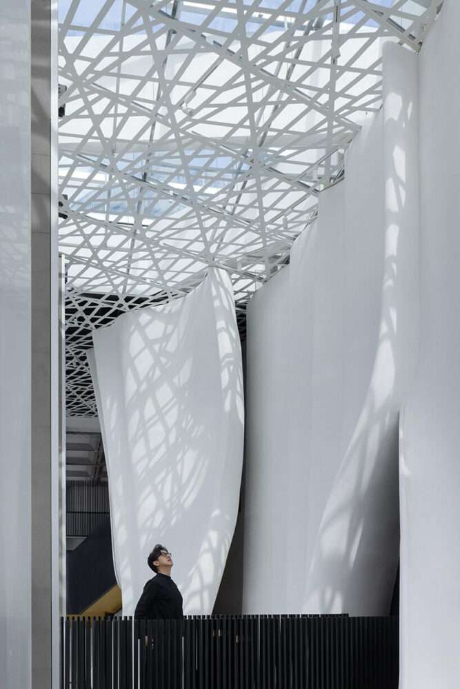 the veil: groundwork architects sculpts sinuous interiors like draped fabric