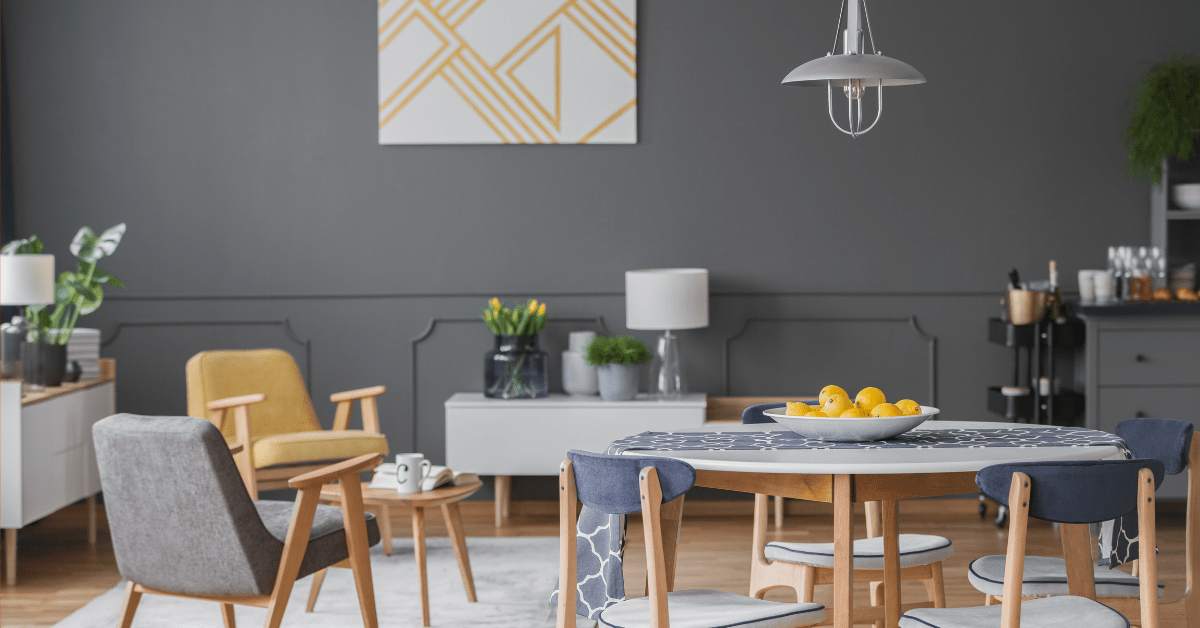 A grey living room with yellow accents.