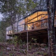 Exterior of Quilanto House in a forest by Hebra Arquitectos