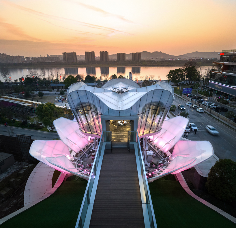 line+ studio's lotus-shaped dynamic building in changsha opens up its outer skin like petals
