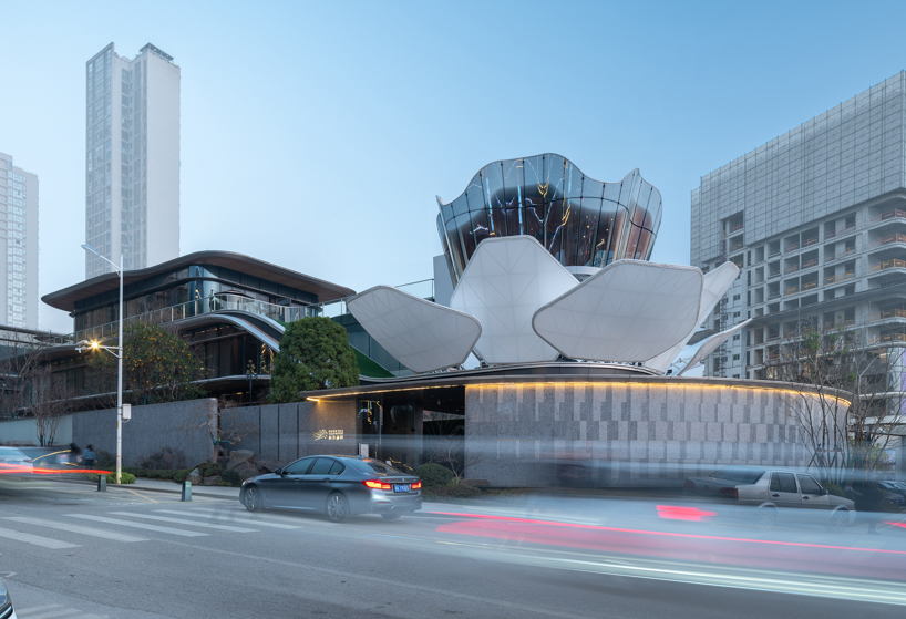 line+ studio's lotus-shaped dynamic building in changsha opens up its outer skin like petals