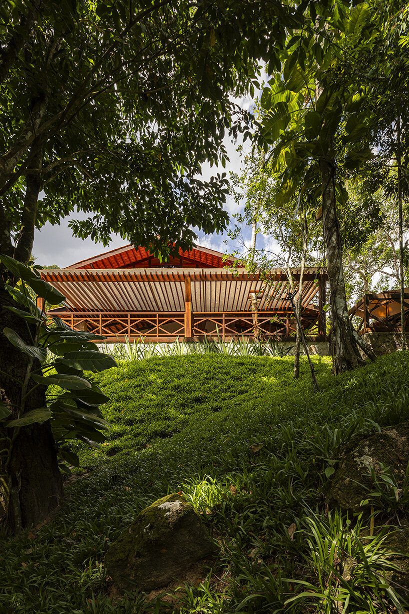 secluded casa sótão provides multi-level views to the lush brazilian landscape