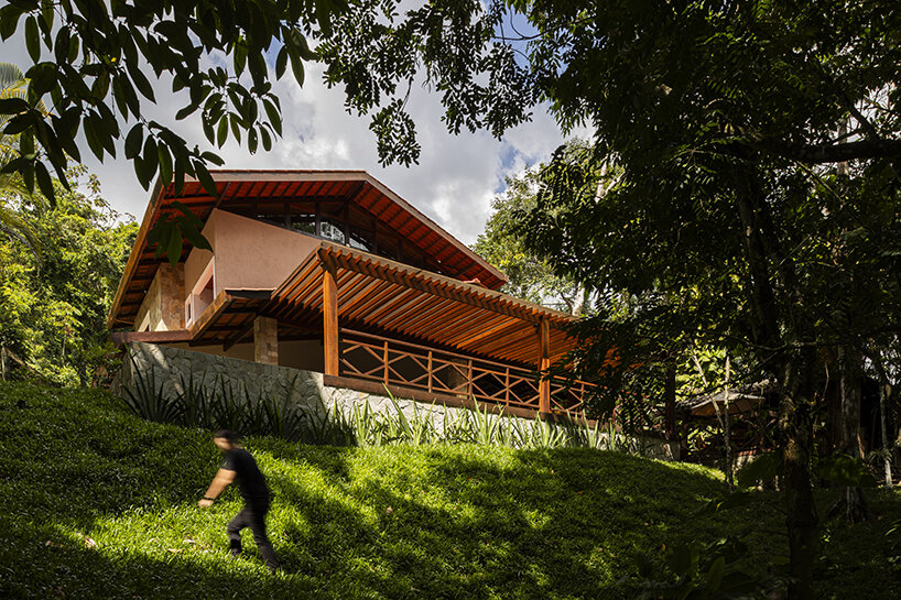 secluded casa sótão provides multi-level views to the lush brazilian landscape