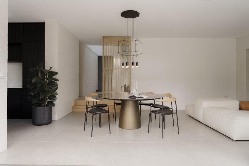 Dining space within brick home by Smith Young Architects