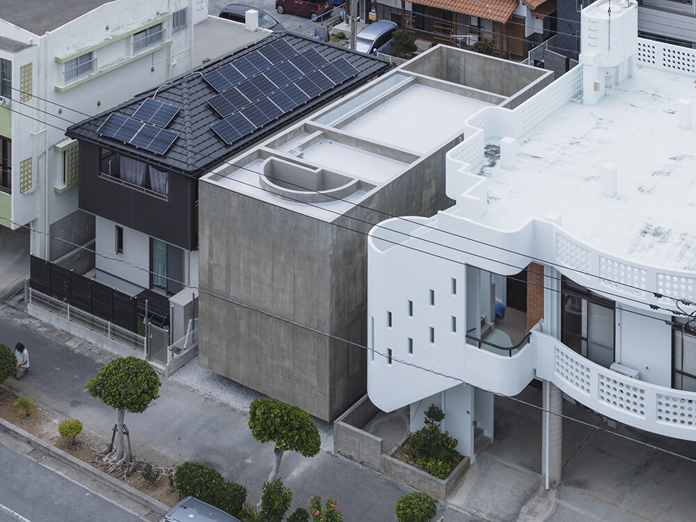 studio cochi architects' house in nishizaki stands as a windowless concrete block in okinawa