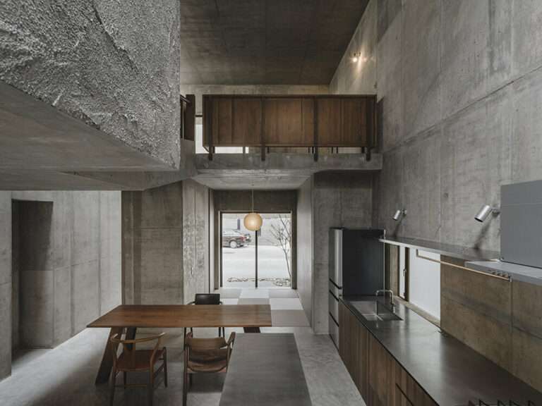 studio cochi architects’ house in nishizaki stands as a windowless concrete block in okinawa