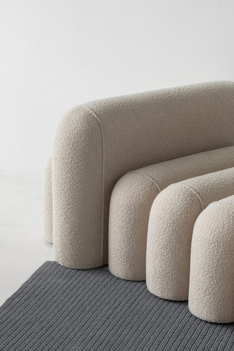 Modular modern seating with textured upholstery.