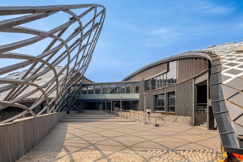 Entrance to sports facility by MOFA Studios