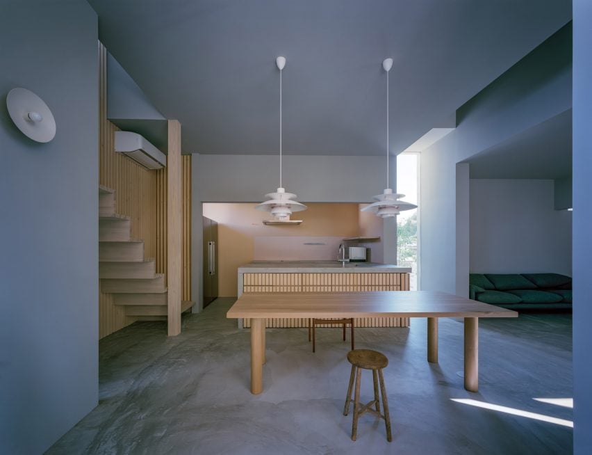 Grey-walled kitchen with wooden furnishings