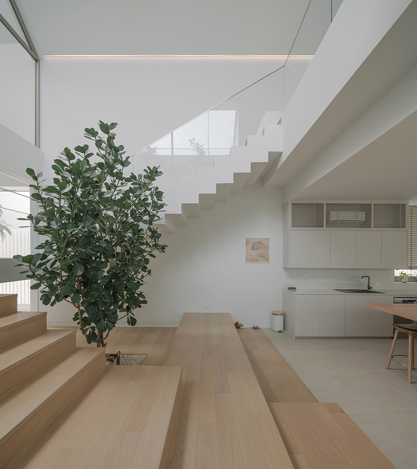 anonym studio's all-white house in bangkok adopts scandinavian minimalism