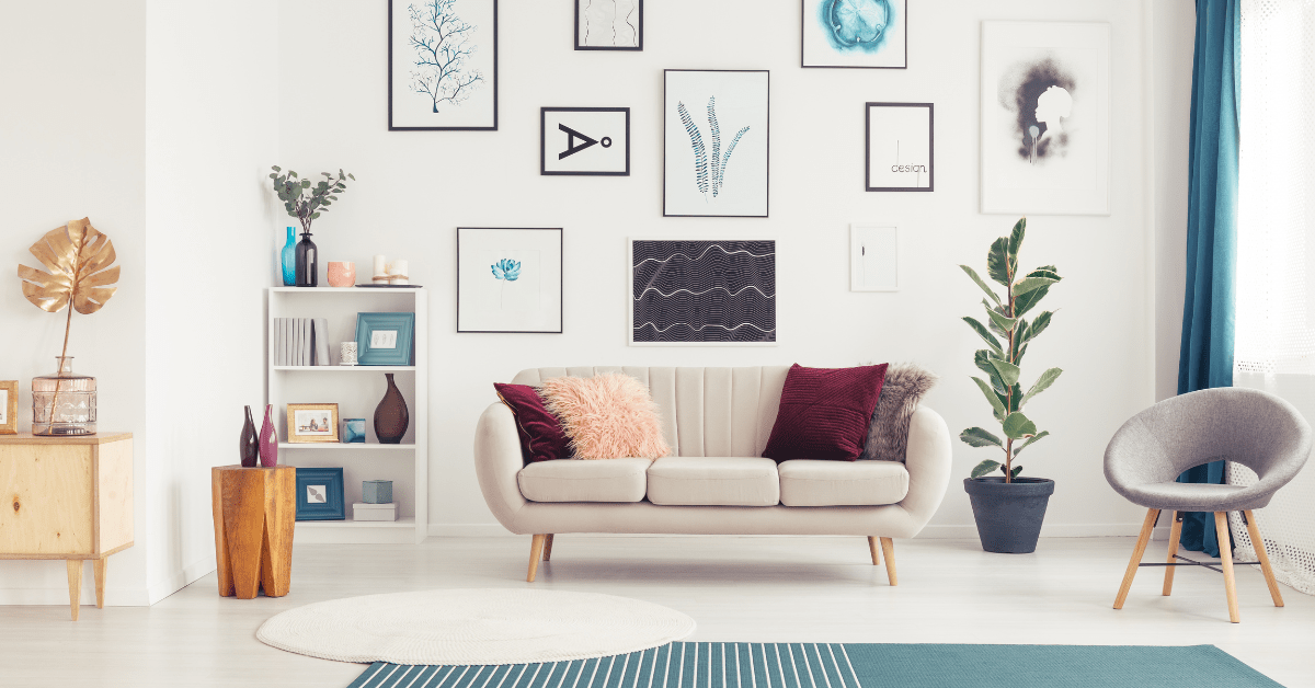 Couch in living room flanked by gallery wall.