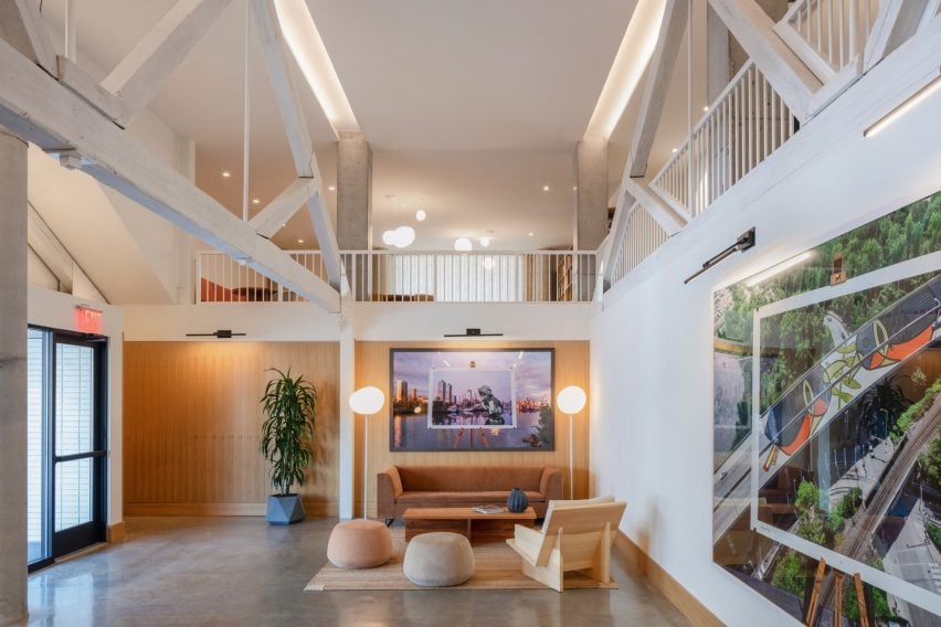 A lobby located within a gabled former warehouse building