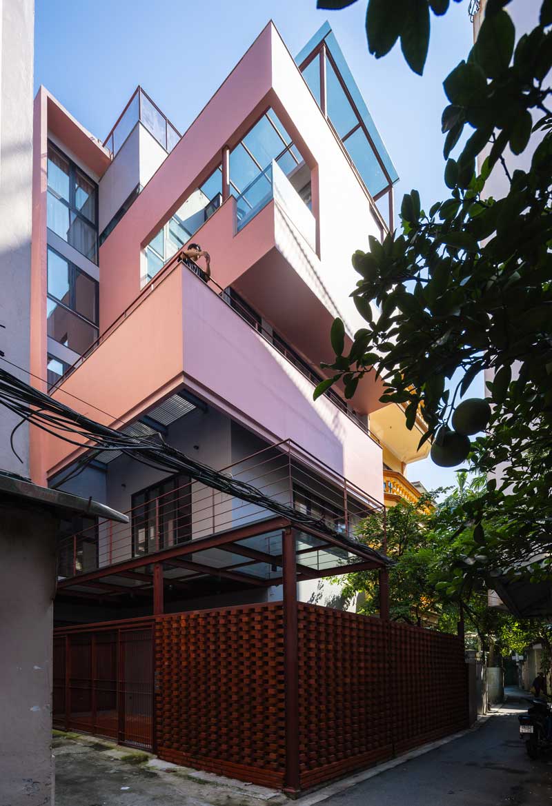 TOOB studio stacks pink open blocks reviving terraced residence in vietnam