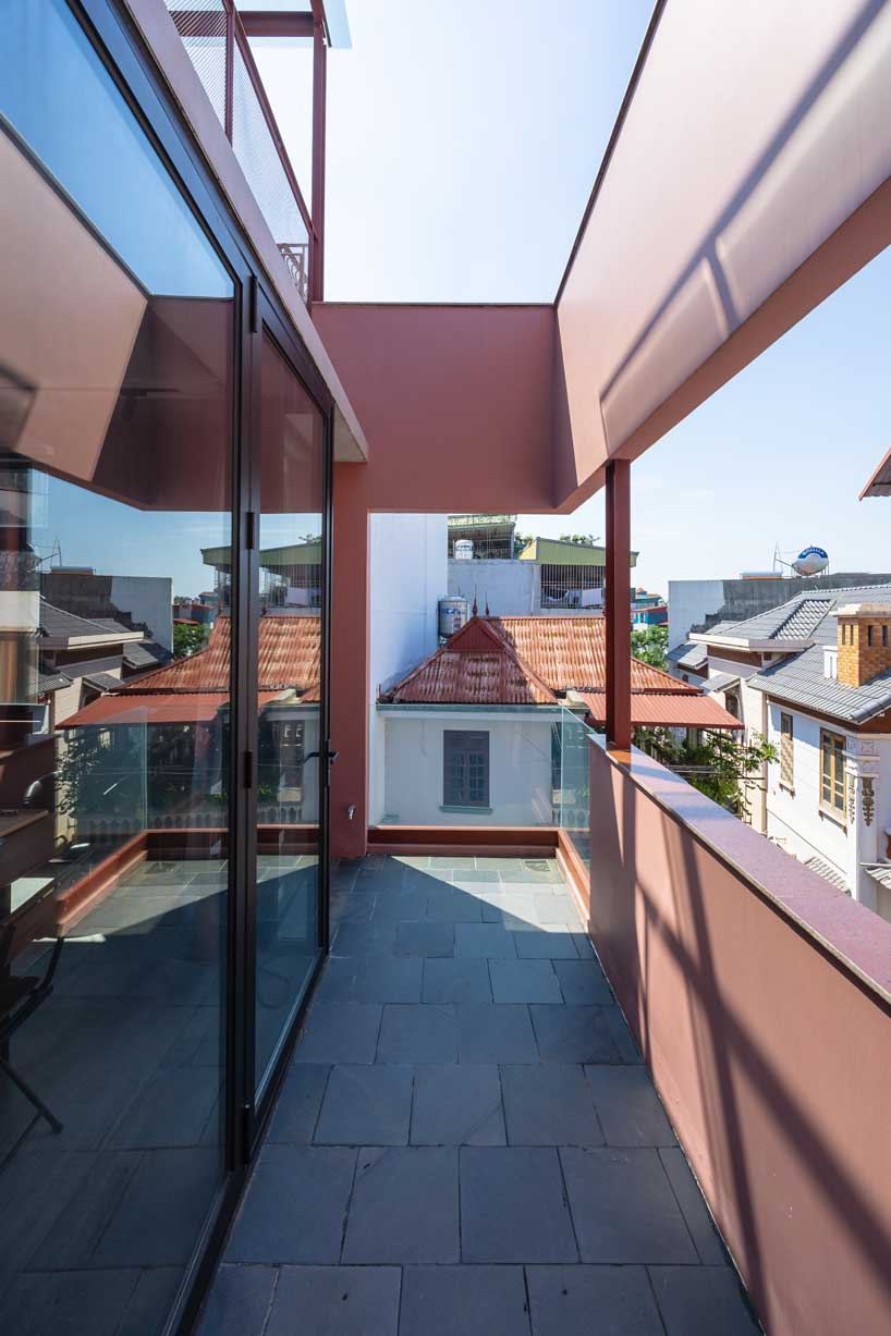 TOOB studio stacks pink open blocks reviving terraced residence in vietnam