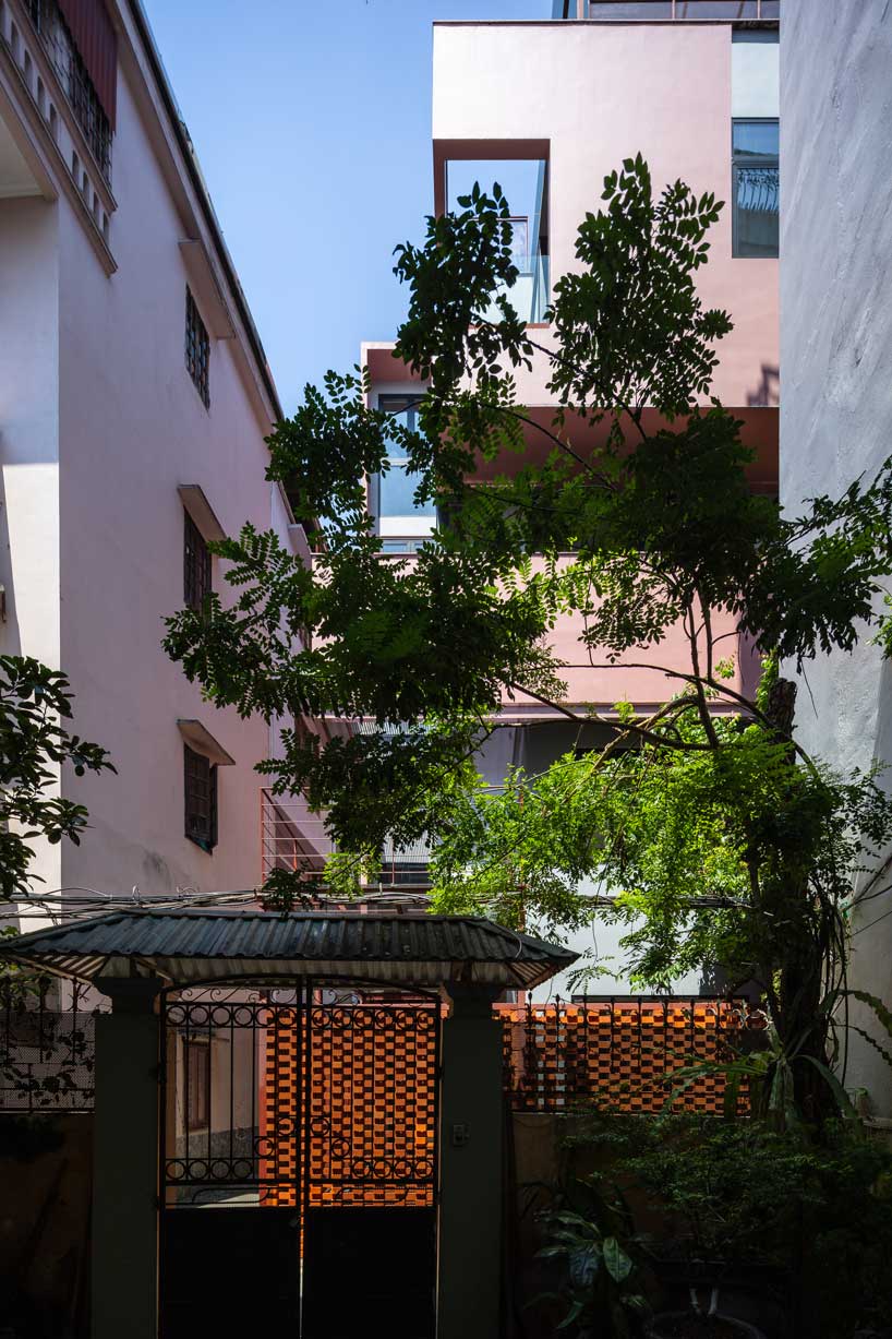 TOOB studio stacks pink open blocks reviving terraced residence in vietnam